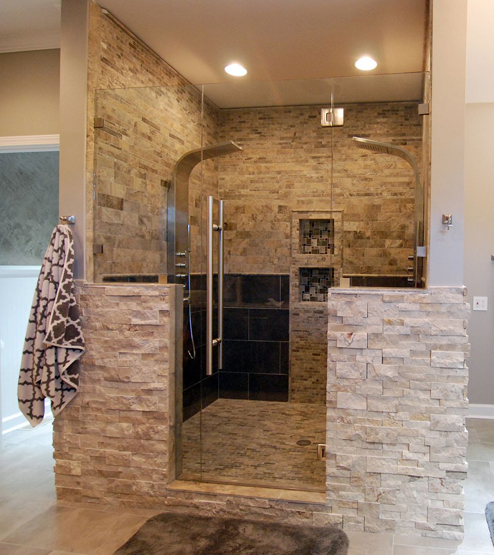 Glass to Glass Hinge. Used to avoid header. Door can be supported by a thicker piece of glass, 1/2" thick, that is secured into the wall using clamps.