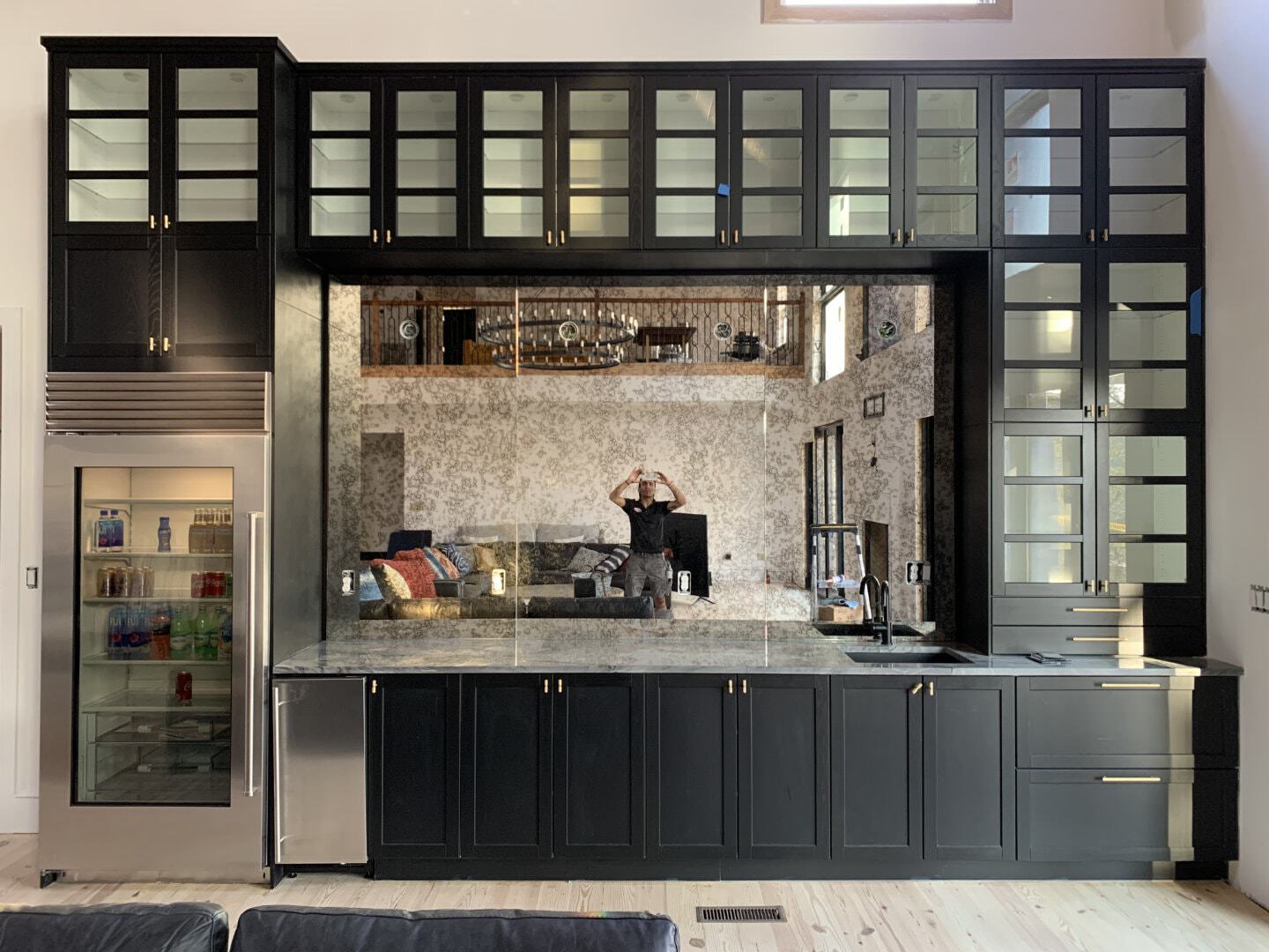 This antique mirror bar backsplash is the GRIGIO pattern. Come by our showroom to see more examples of antique mirror!