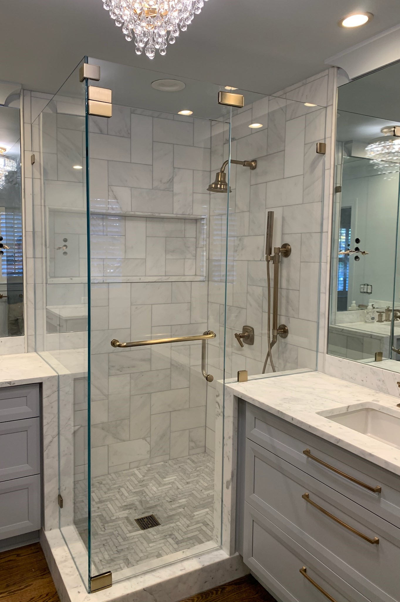 This is Brushed Bronze hardware which matches Delta's Champagne Bronze fixtures! This is beautiful lighting to show off the color and tone of the hardware.