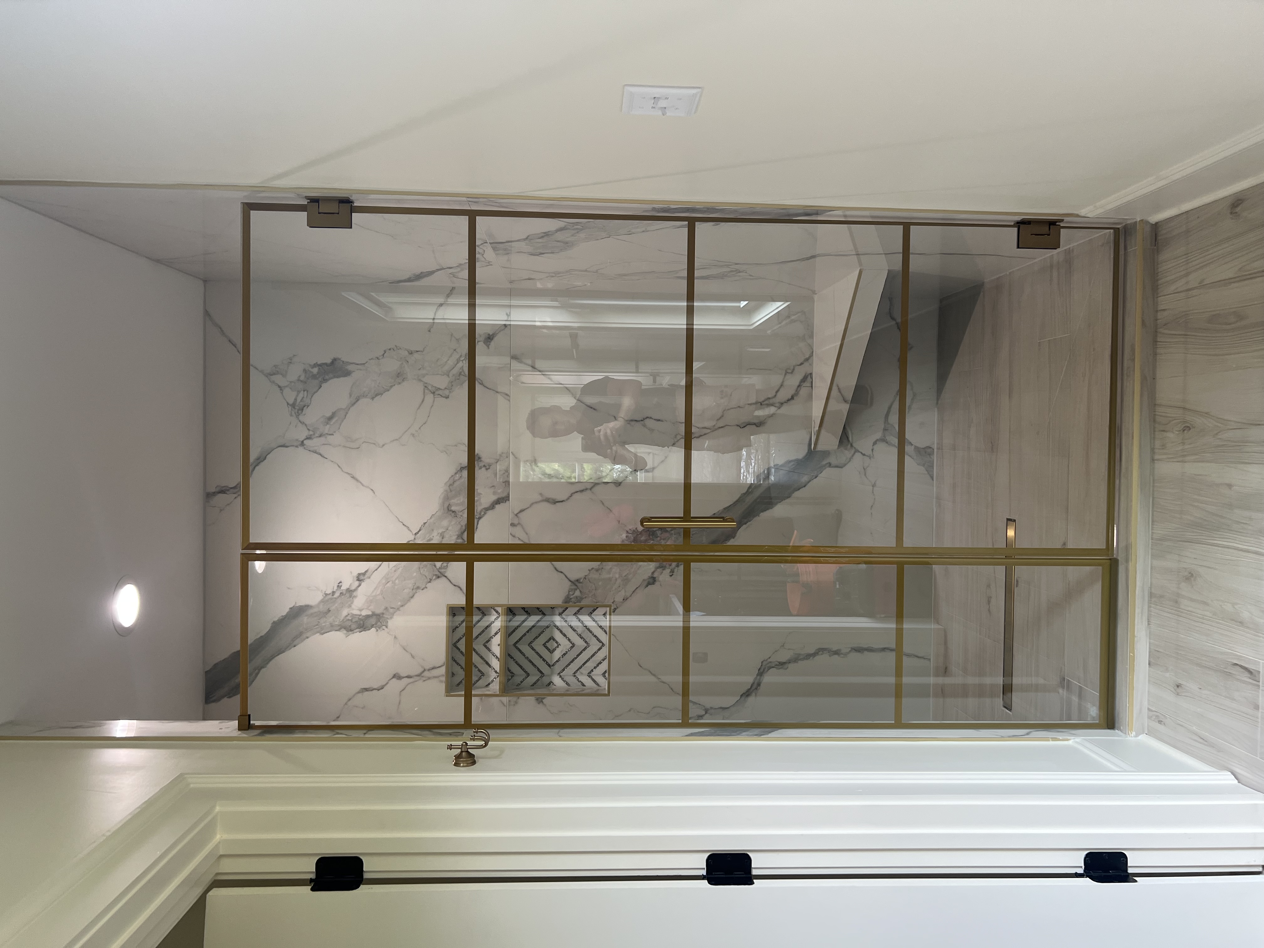 This is a custom grid shower with gold grids!