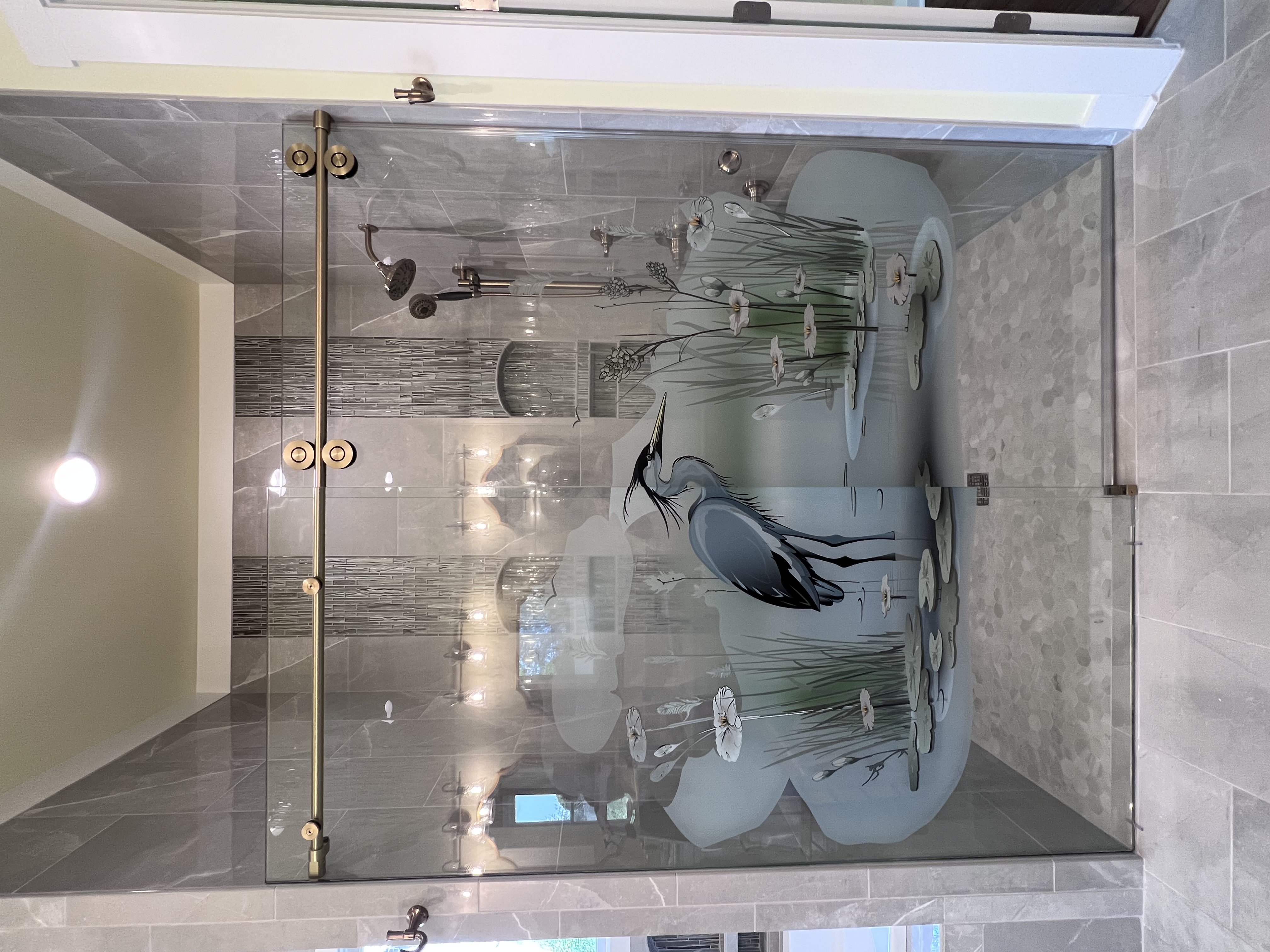 This specialty artwork was ceramic printed onto the glass to create an easy-to-clean, durable, and permanent image on the glass! Ask us about ceramic printing and glass art!